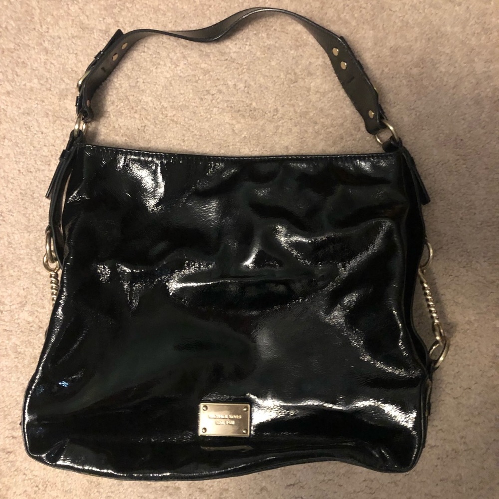 MK black patent leather hobo bag